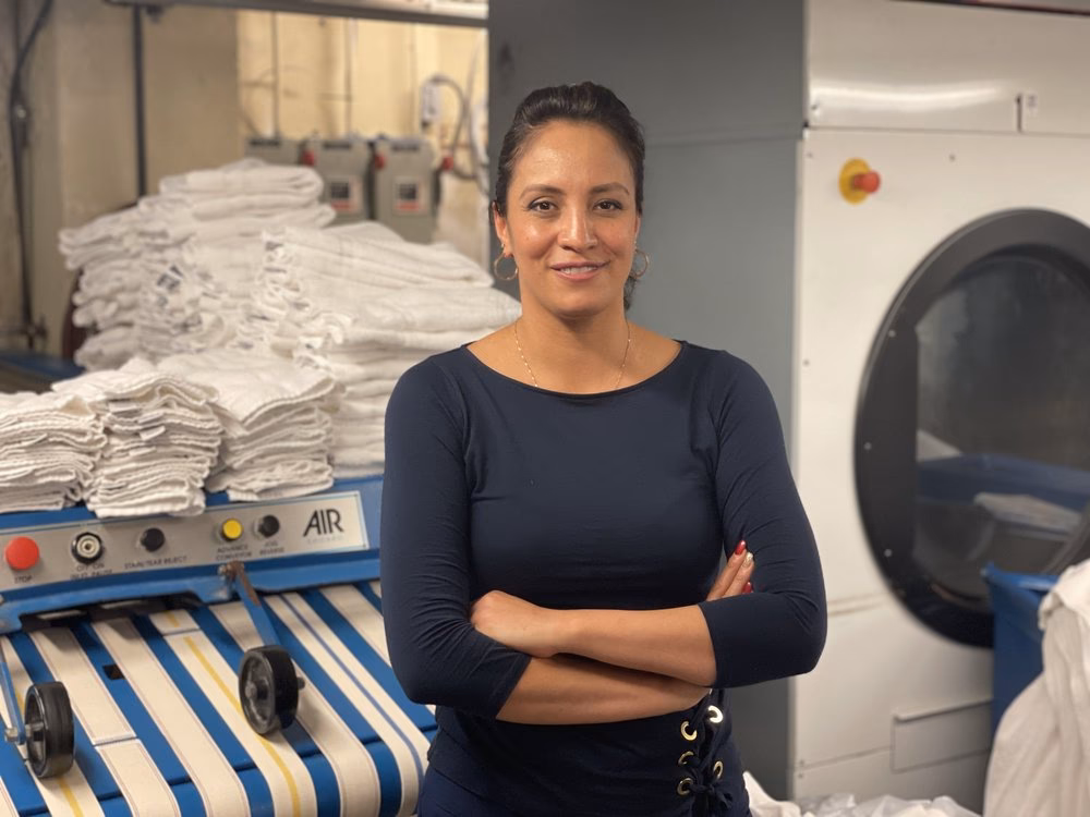 What is the role of laundry staff in a hotel?