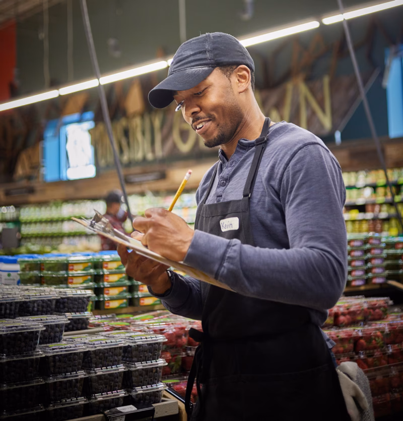 What does a supermarket attendant do?